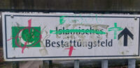 Infotafel eines muslimisches Grapfelds